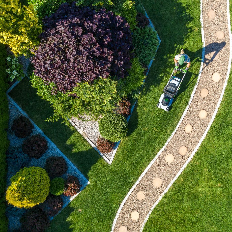 Landscaping Companies, Landscaping Services, Professional Lawn Maintenance Crew Mowing Residential Property In Thornton, Lafayette, Broomfield, Westminster, Erie, CO
